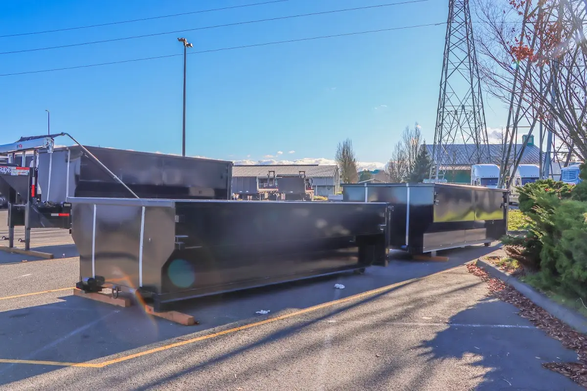 Roll-off dumpster ready for waste disposal at job site for 2 Yard Dumpster Rental in Fitchburg